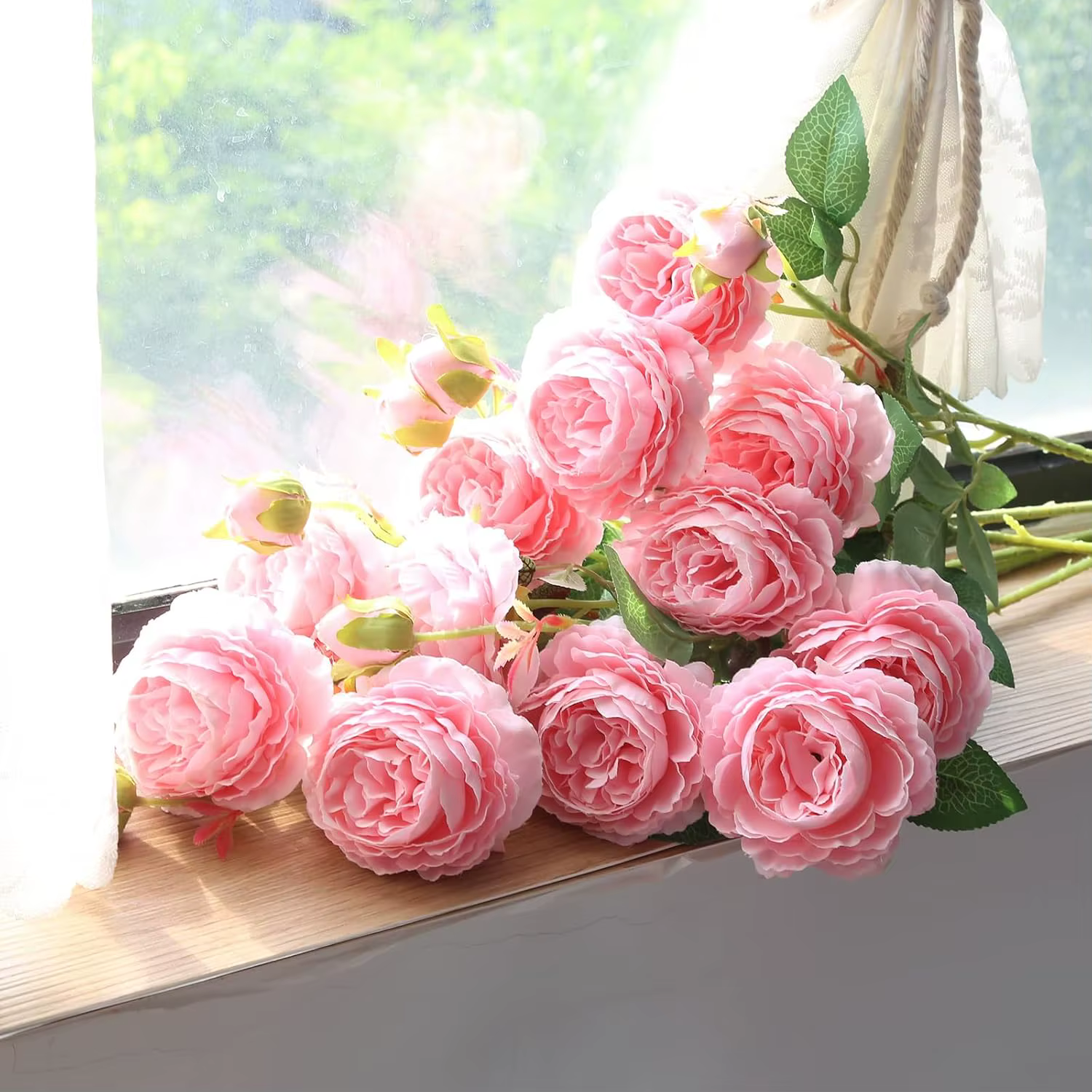 Fleurs artificielles de Ranunculus roses