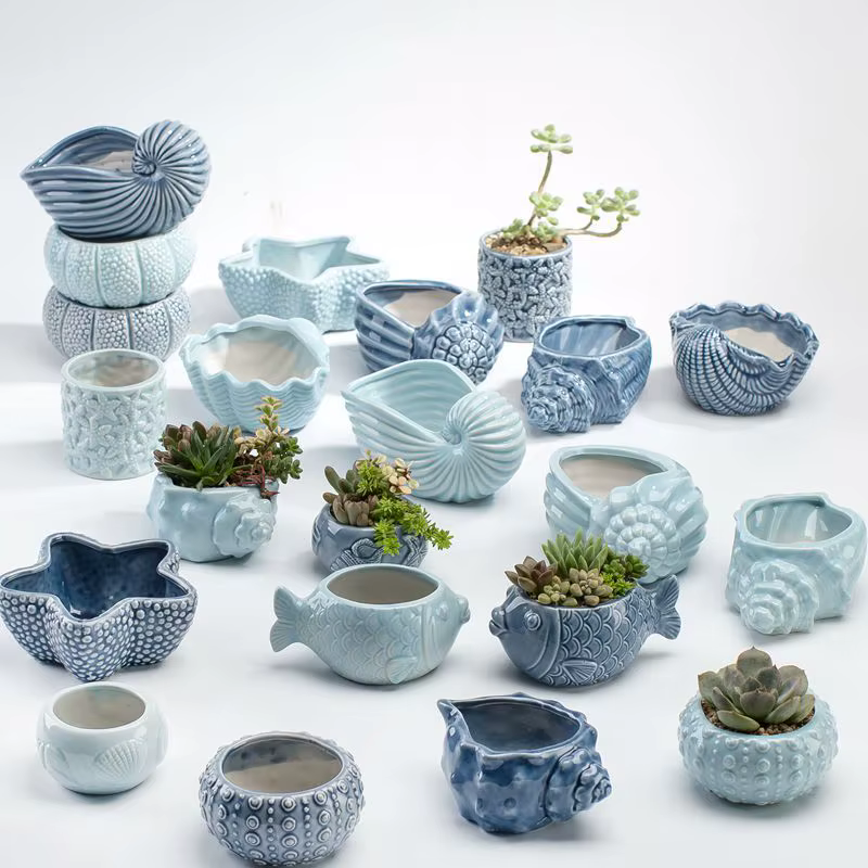 Pot de fleurs miniature en forme de baleine et de coquillage