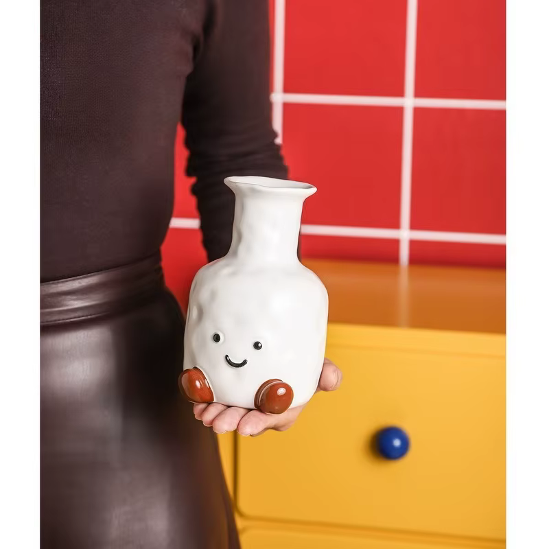 Vase à visage souriant mignon