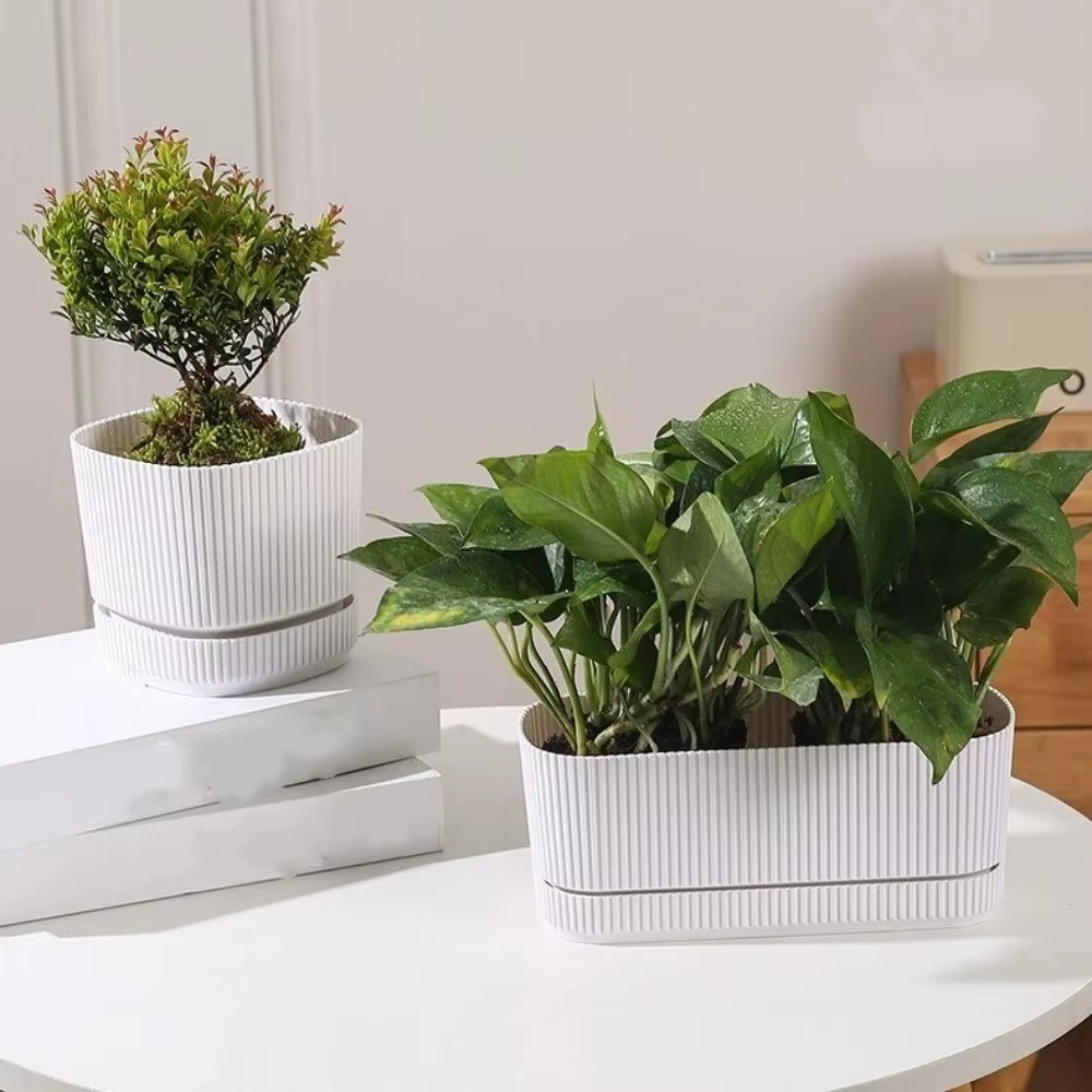Pot de fleurs auto-arrosant à double couche avec trou de drainage