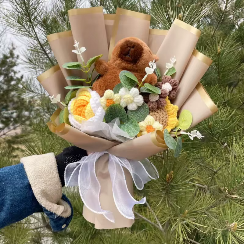 Adorable Capybara avec des fleurs artificielles