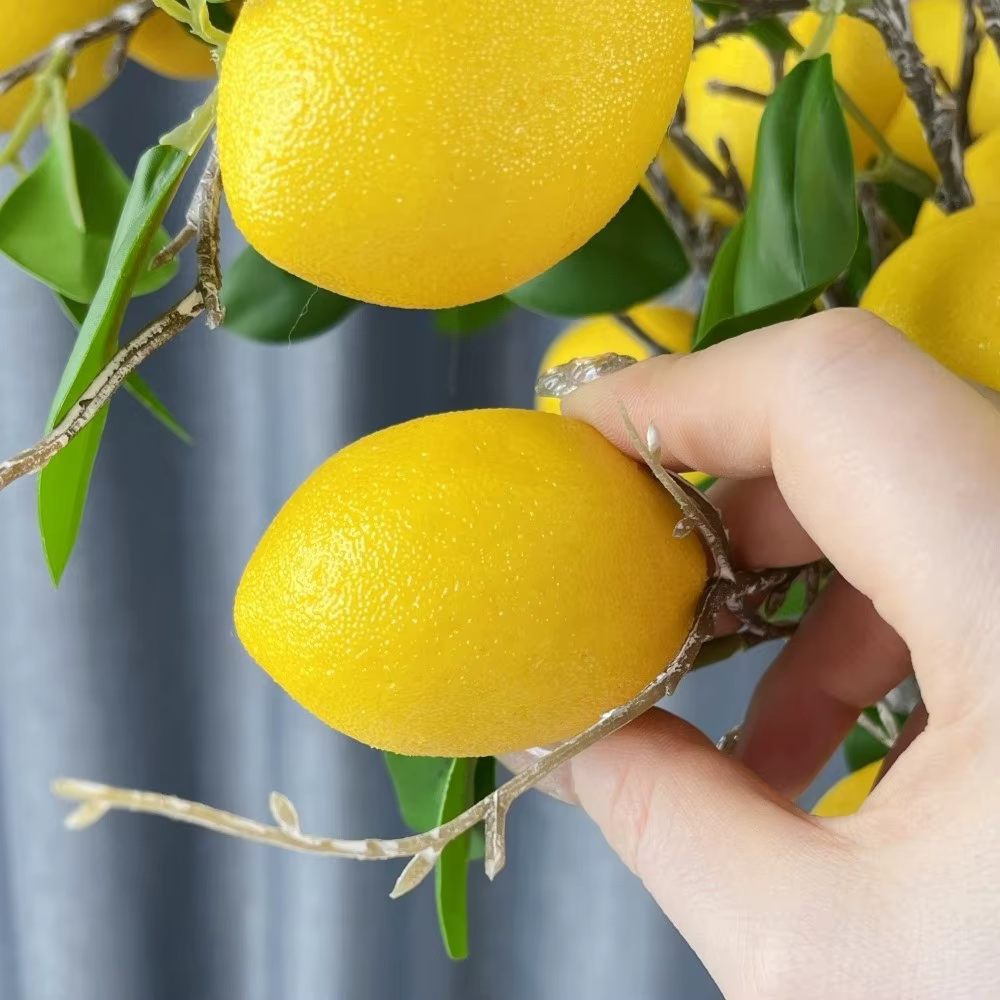 Branche de citron artificielle à feuilles vertes