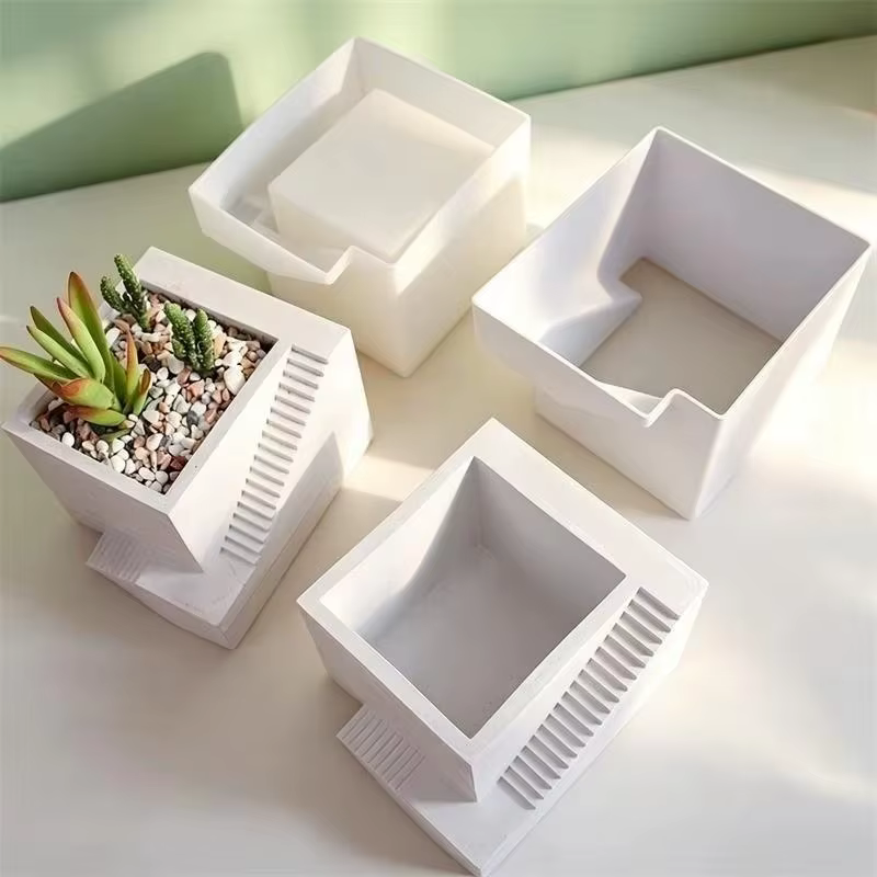 Pot de plantes succulentes en forme d'escalier carré