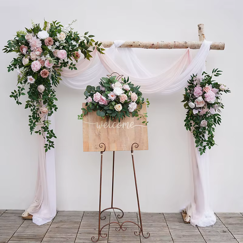 Série rose blanc avec panneau de bienvenue vert