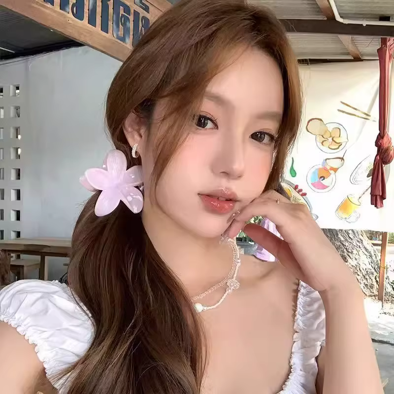Frangipani frais et doux oeuf fleur arrière de la tête disque cheveux requin pince