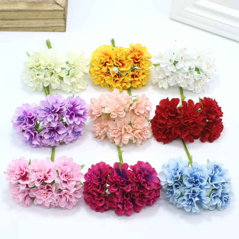 Oeillet de fleurs en soie simulée
