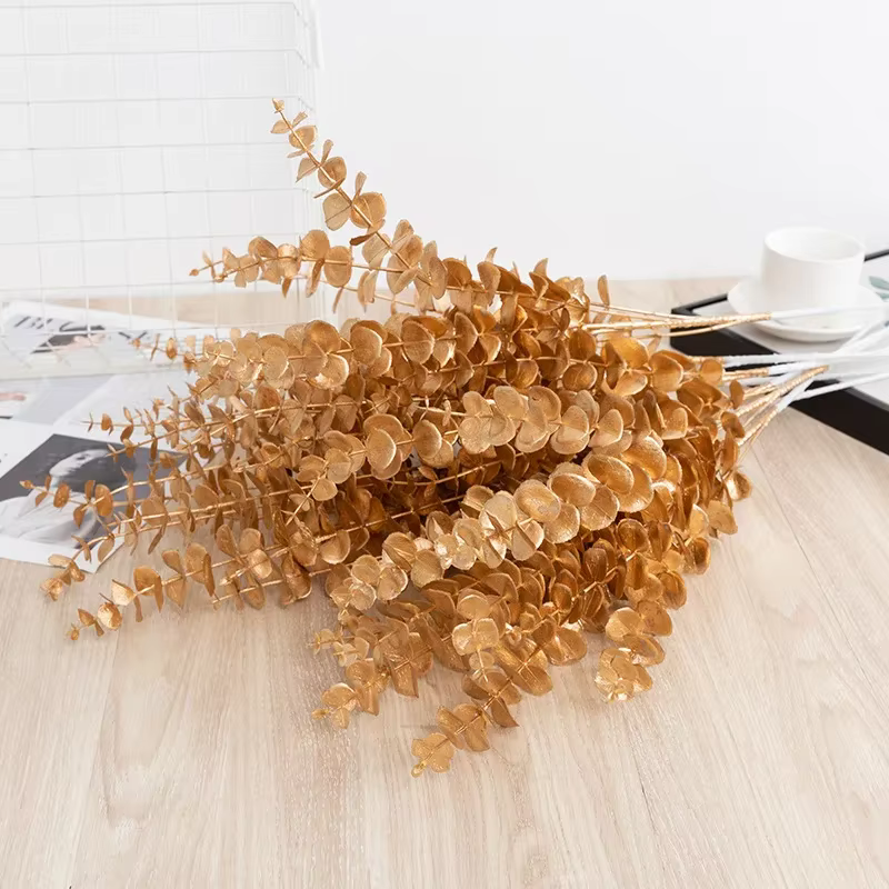 Fleur artificielle d'eucalyptus doré pour la décoration de la maison