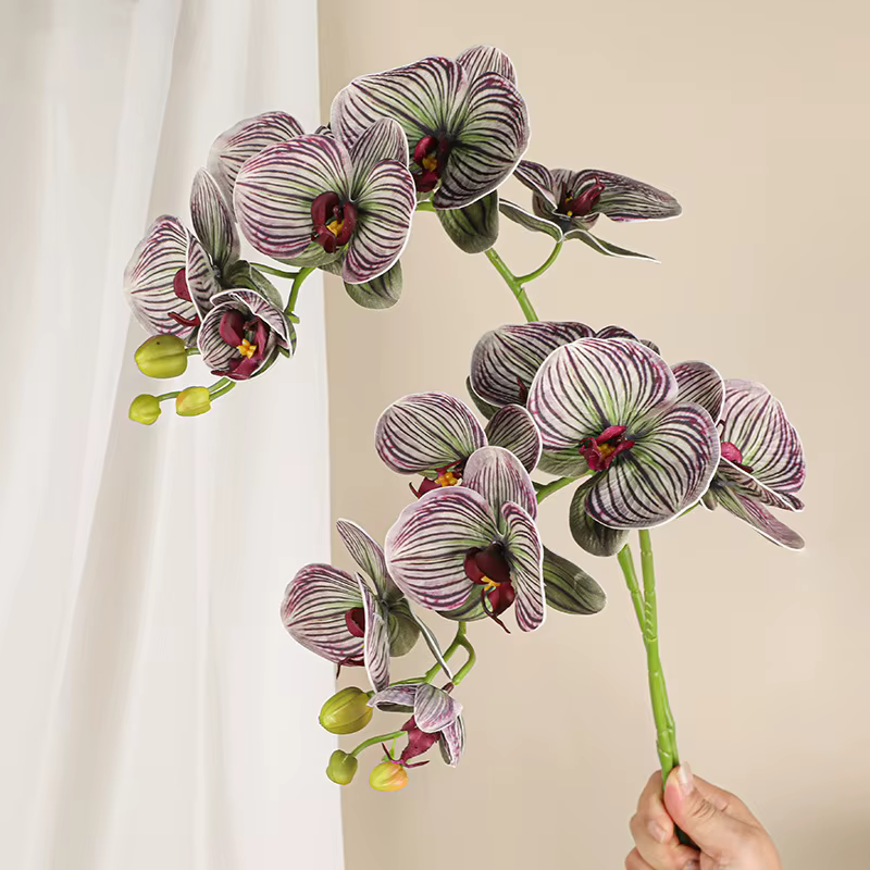 Branche de fleurs artificielles orchidées