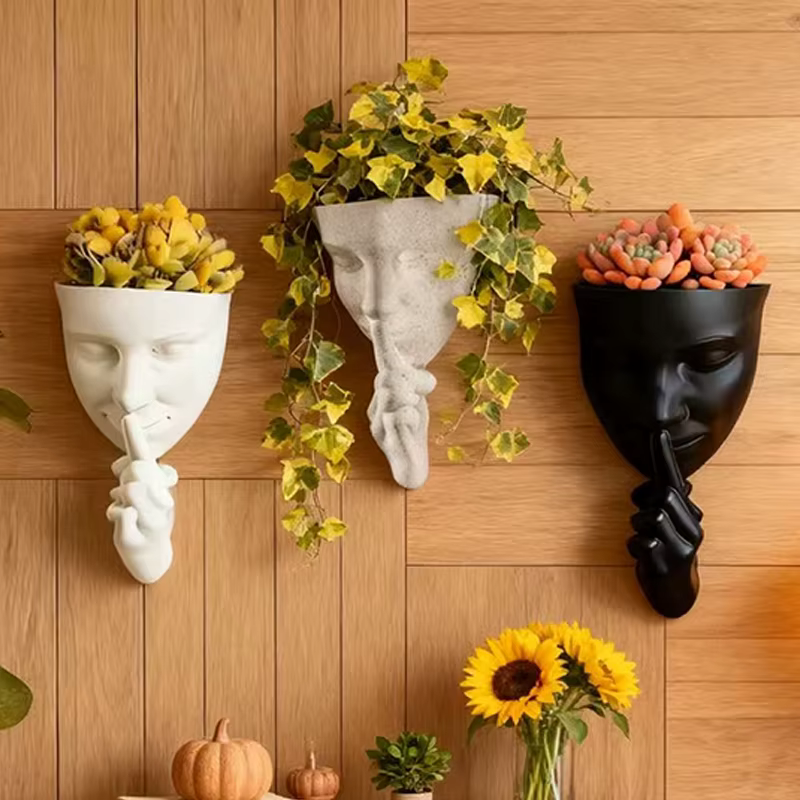 Pot de fleurs mural artistique en forme de visage