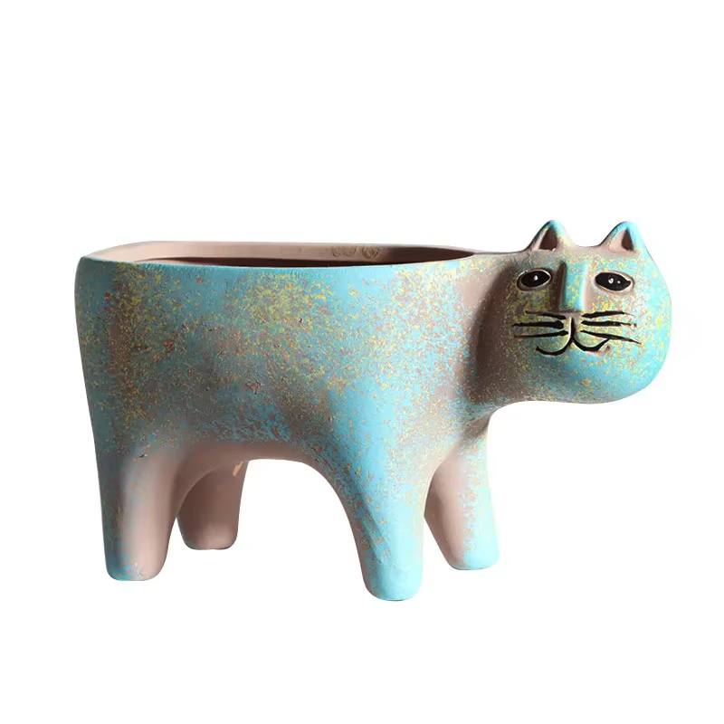 Pot de fleur en céramique de chat mignon