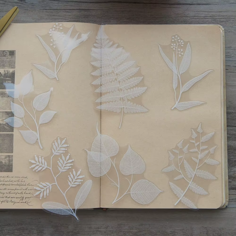 Autocollants en forme de feuilles blanches