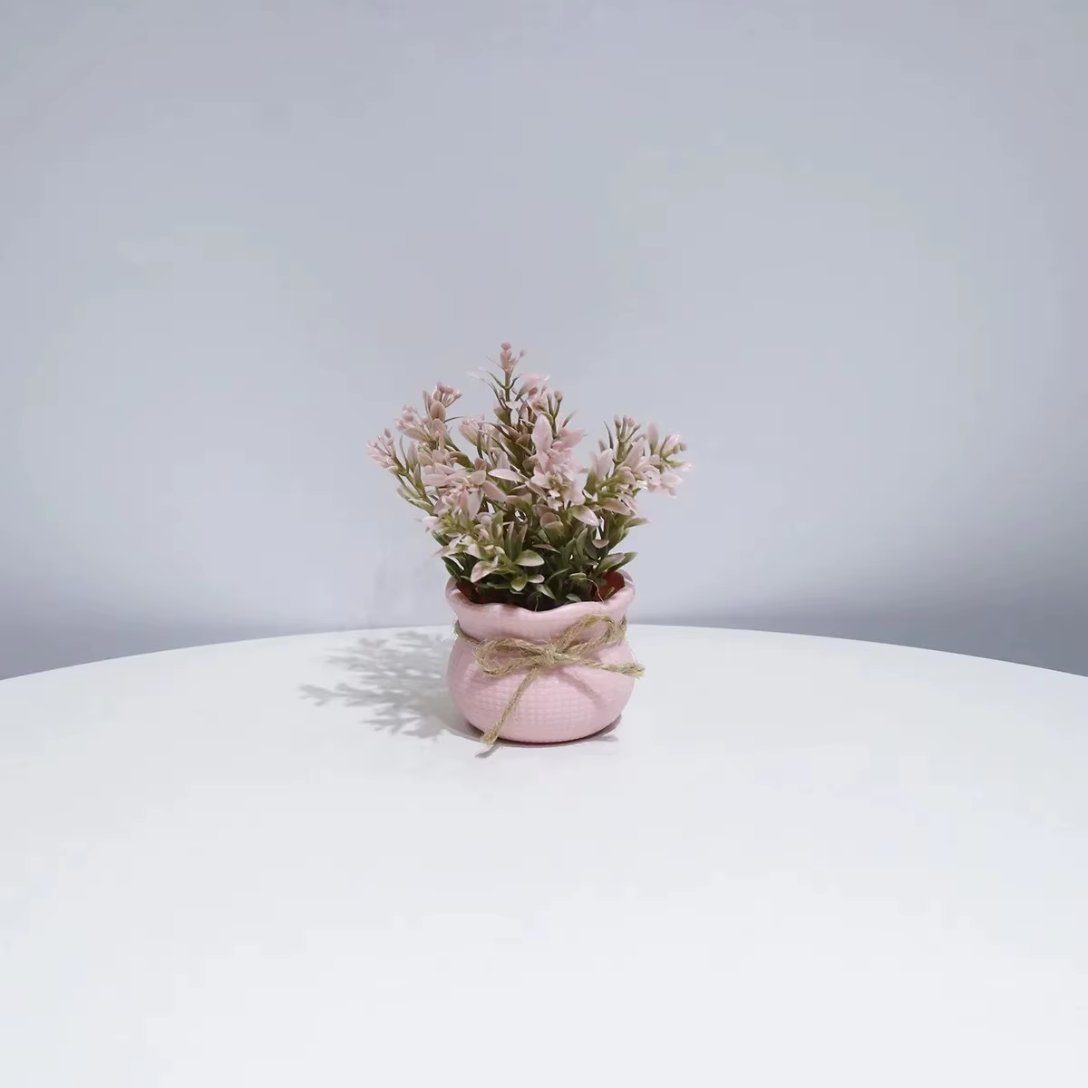 Mini-fleurs artificielles roses en pot
