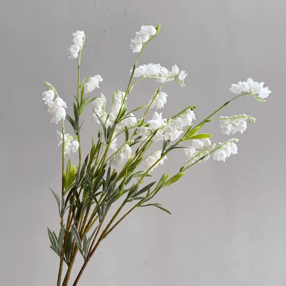 Fleurs artificielles réalistes de lys de vallée