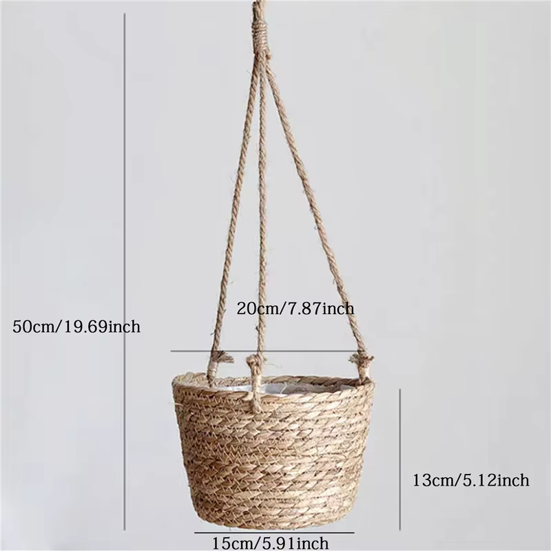 Paniers de fleurs suspendus tissés en herbe