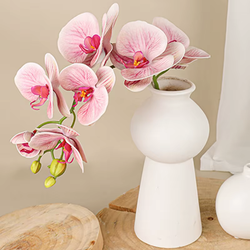 Branche de fleurs artificielles orchidées