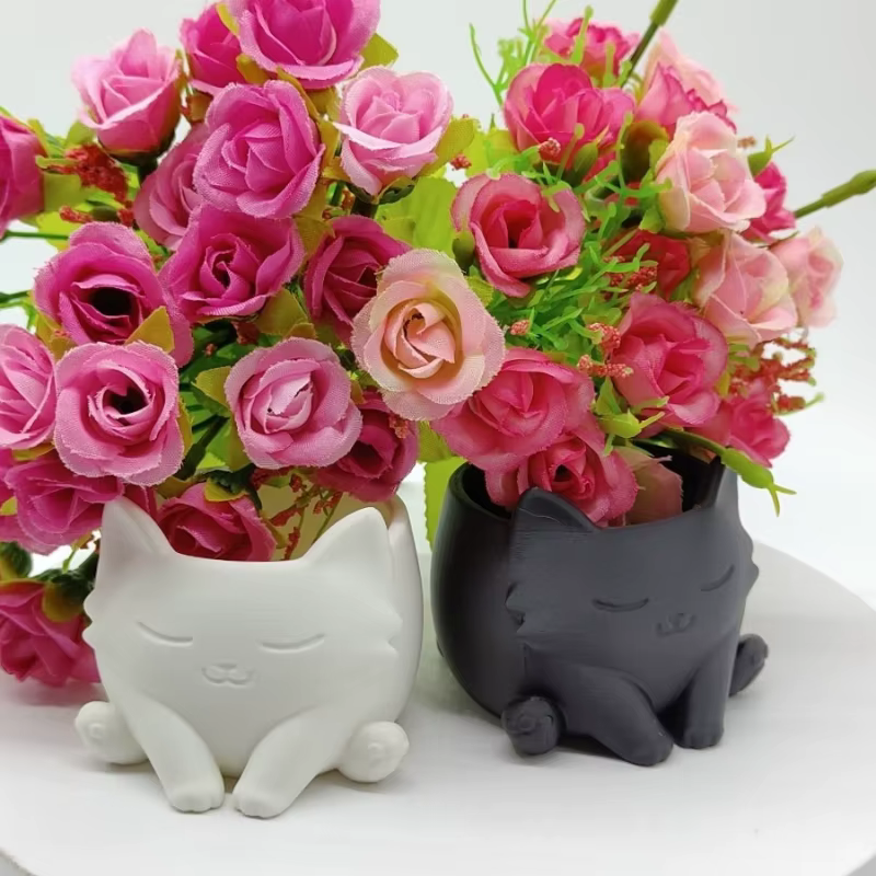 Pot de fleurs en forme de chat mignon
