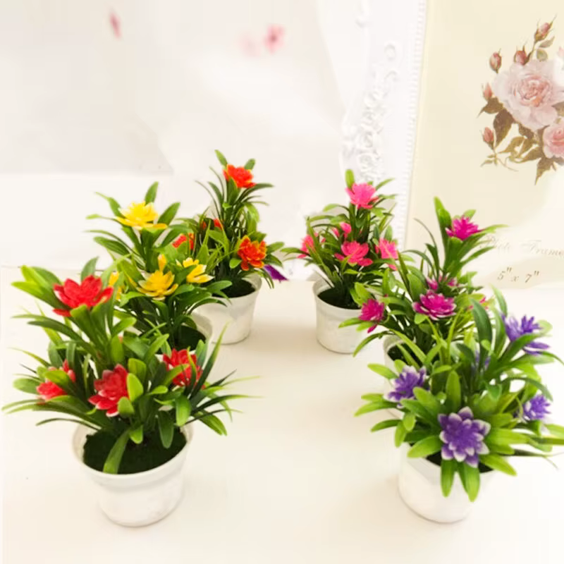 Pot de plantes à fleurs artificielles