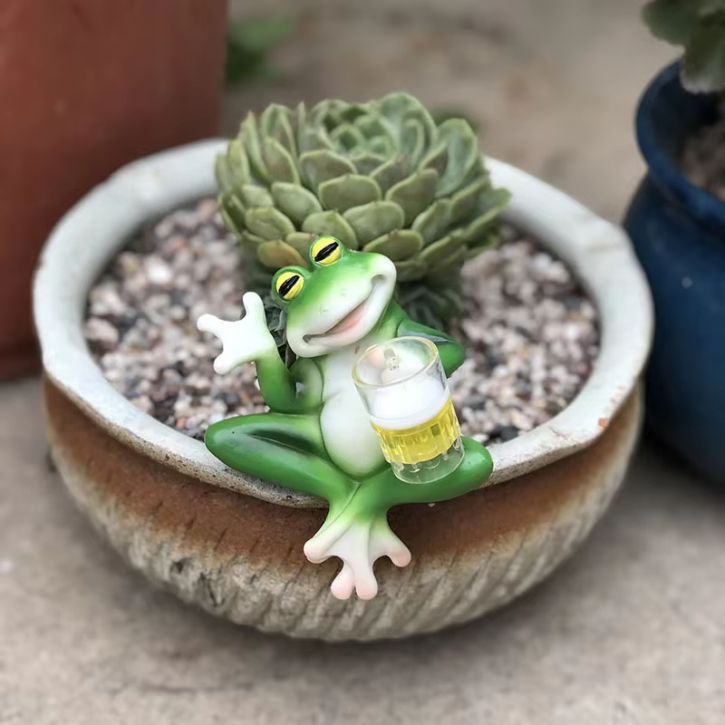 Décorations de cintre de plante de Figurine de grenouille pour des Pots