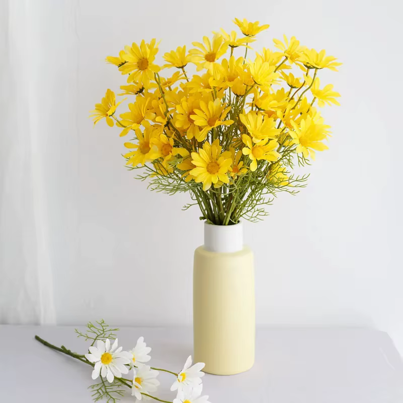 Fleurs artificielles, marguerites