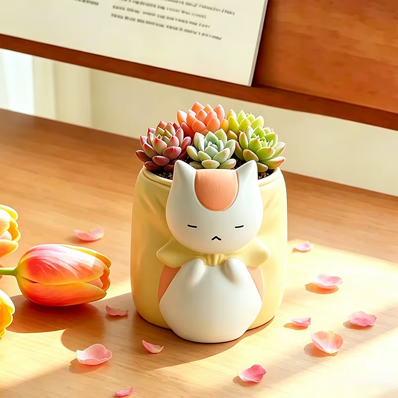 Pot de fleurs en résine chat bouffon endormi