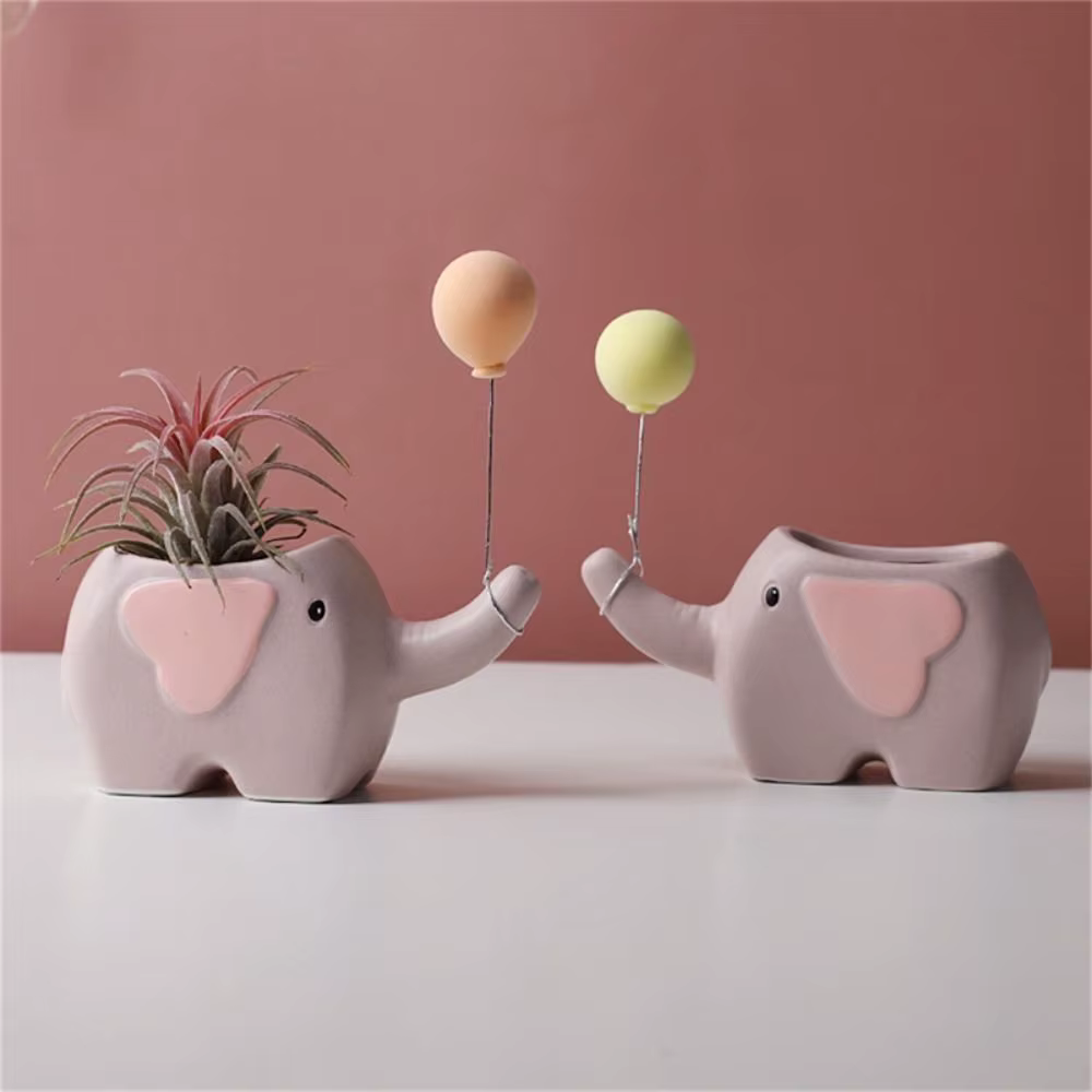 Pot de fleurs en céramique en forme d'éléphant