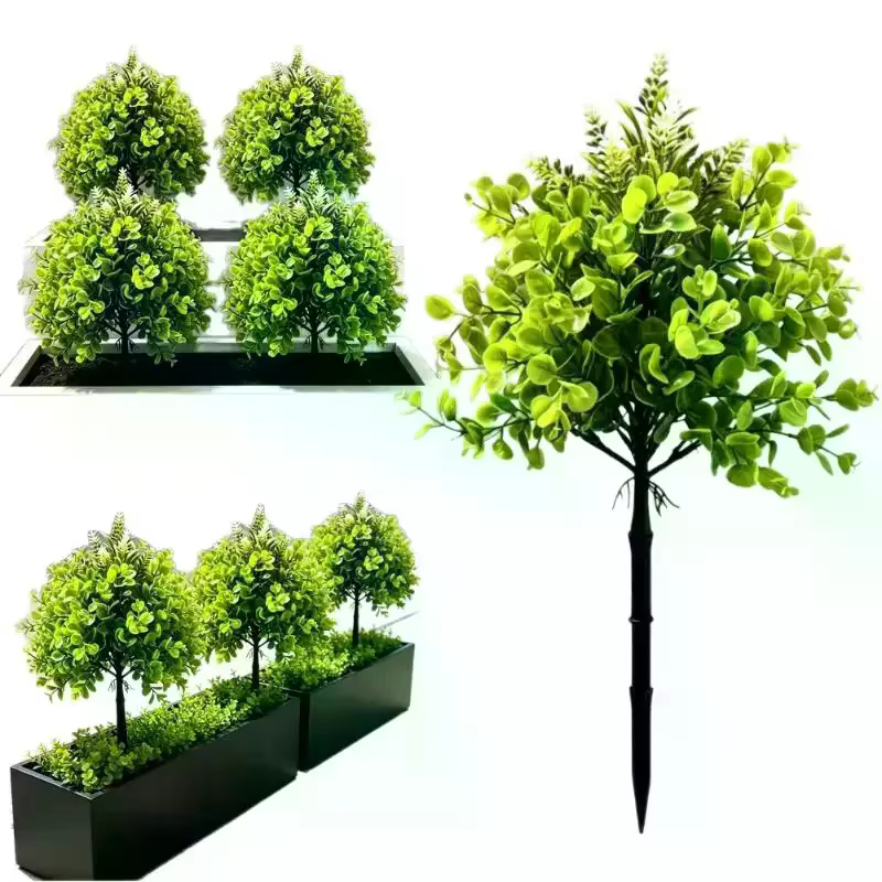 Plantes vertes artificielles sur piquet