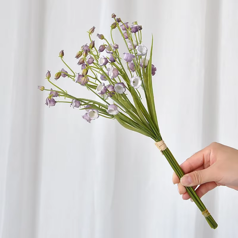Bouquet de fleurs artificielles de muguet