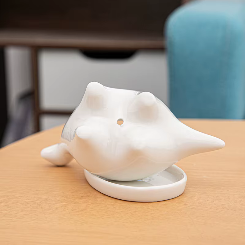 Pot de fleur de dinosaure en céramique blanche