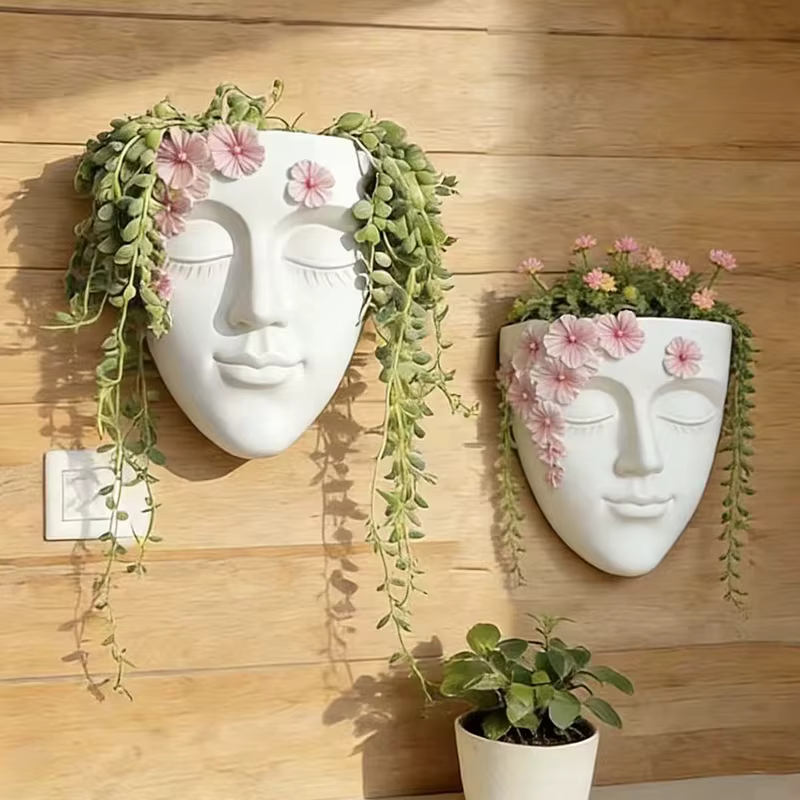 Pot de fleurs mural classique en forme de tête