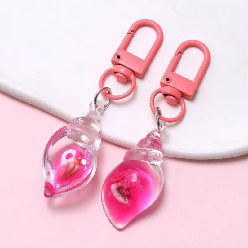 Porte-clés coquillage en acrylique style plage avec huile flottante, lot de 2 pièces, accessoire de sac idéal pour l'ambiance estivale