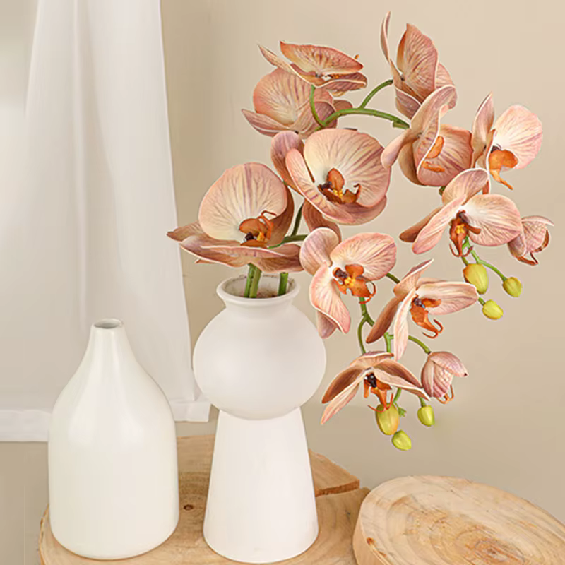 Branche de fleurs artificielles orchidées