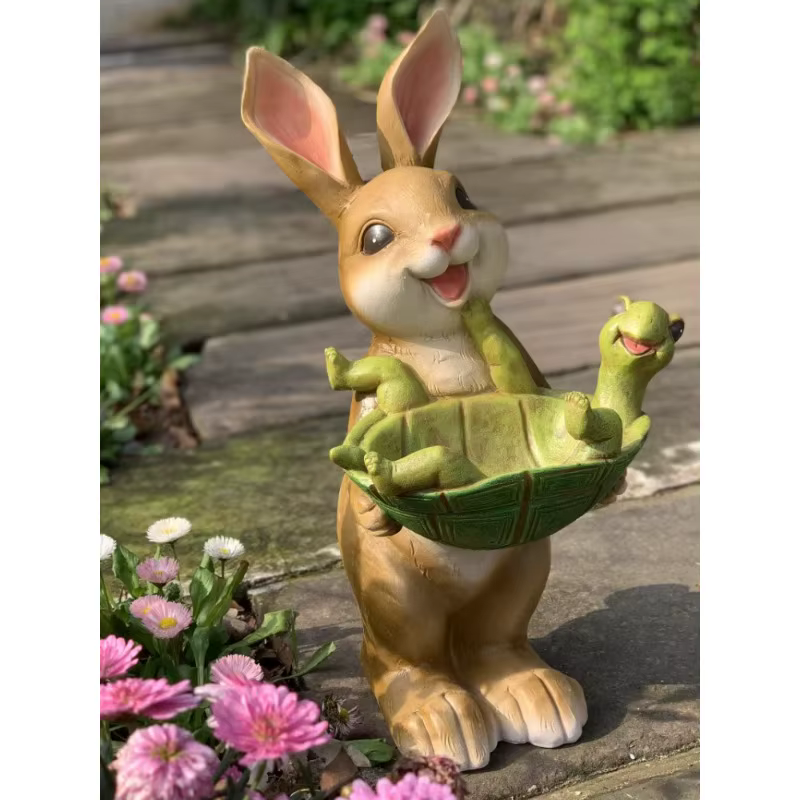 Pot de fleur lapin tenant tortue