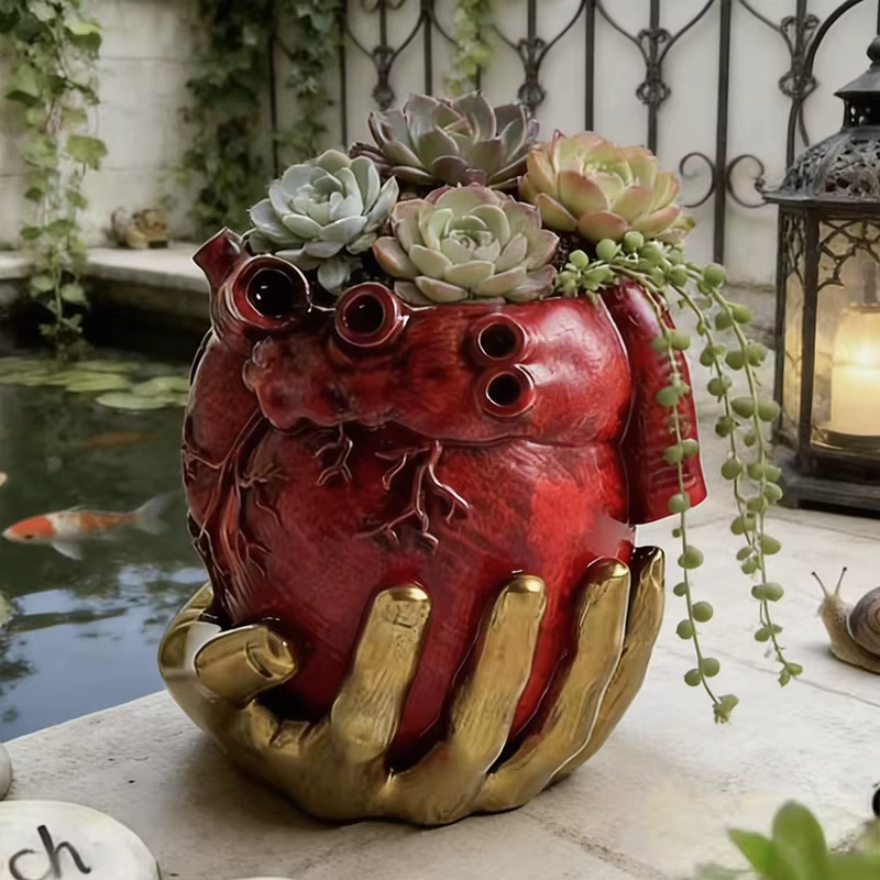Pot de fleurs en résine rouge en forme de cœur anatomique avec support doré pour plantes succulentes
