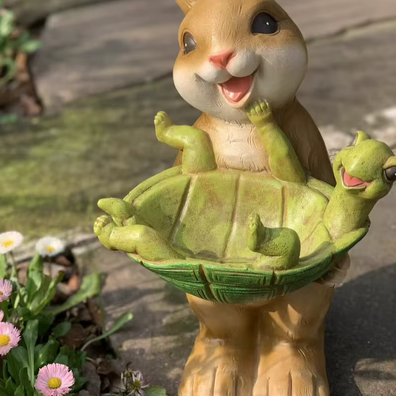 Pot de fleur lapin tenant tortue