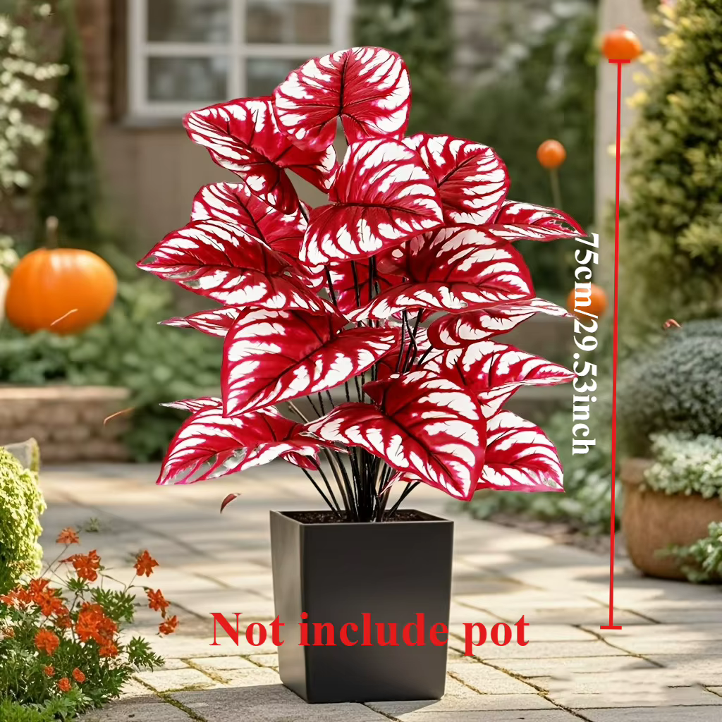 Plante artificielle à feuilles rouges avec rayures blanches