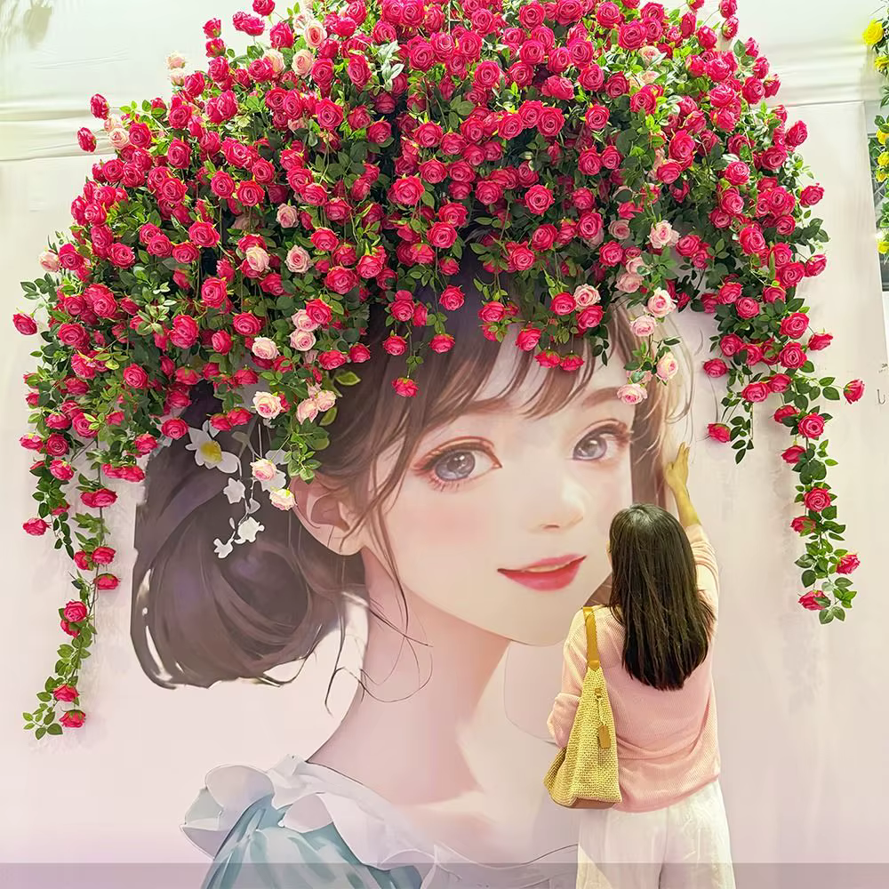 Guirlande de roses artificielles multicolores avec feuilles vertes