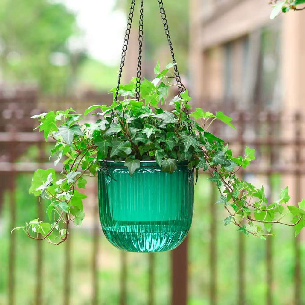 Pot de fleur auto-arrosant avec trous de proximité