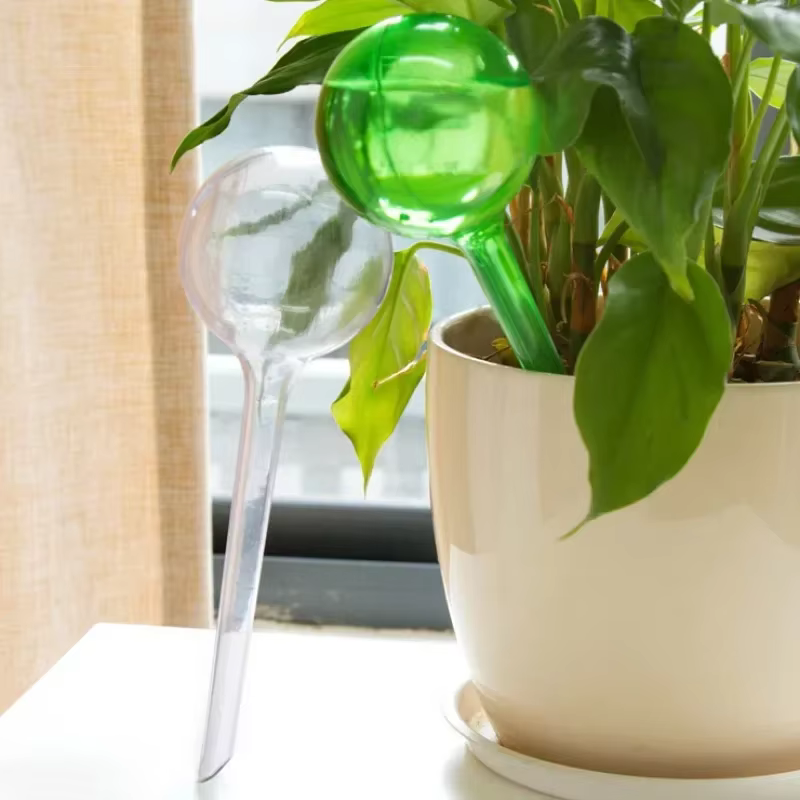 Nouveau Globes d'arrosage automatique canettes d'eau pour plantes fleurs Mini plante