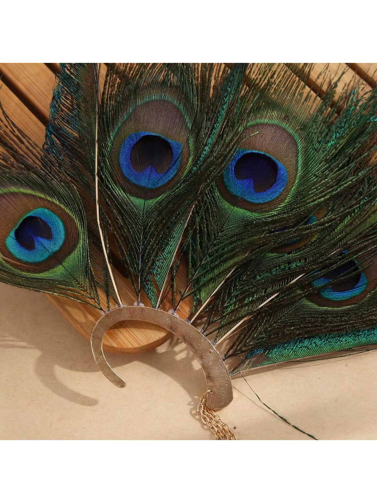 Manchette d'oreille paon