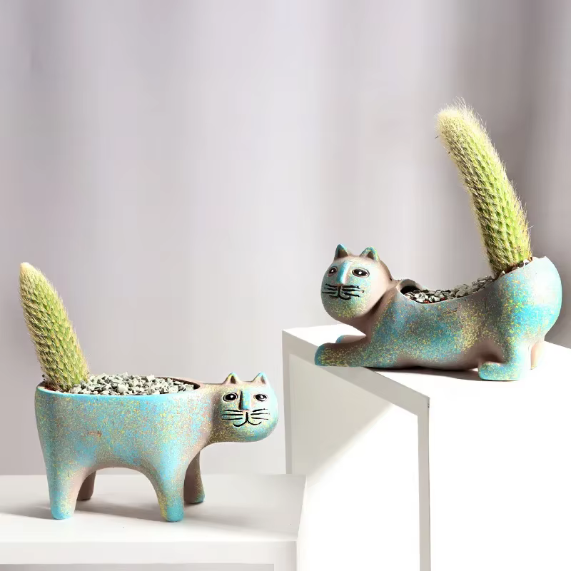 Pot de fleur en céramique de chat mignon