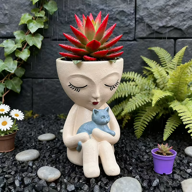 Pot de fleurs créatif en forme de fille assise tenant un chat