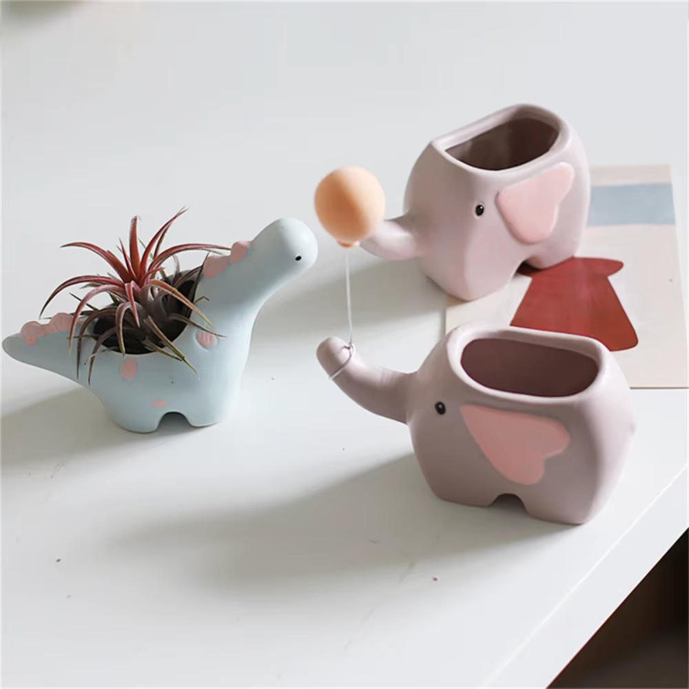 Pot de fleurs en céramique en forme d'éléphant