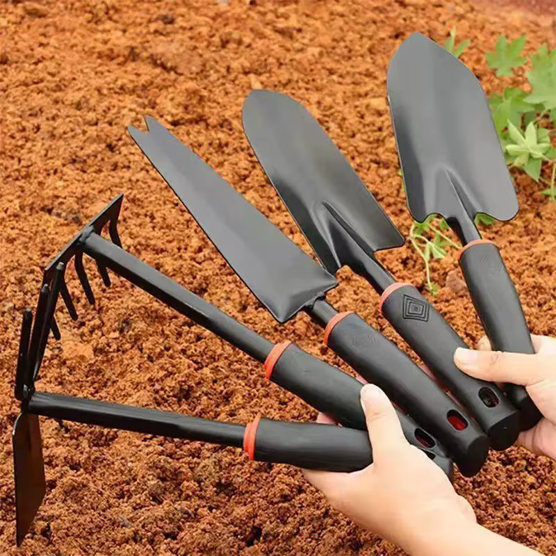 Jardin. Outil de jardinage : mini pelle