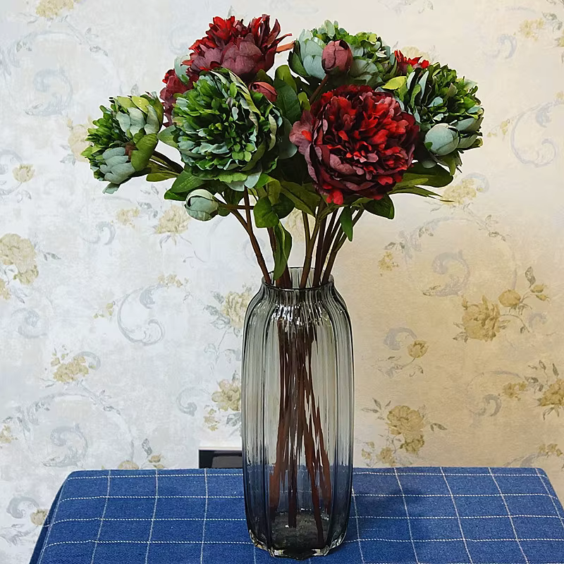 Branche de fleurs artificielles de pivoine de palais avec des feuilles