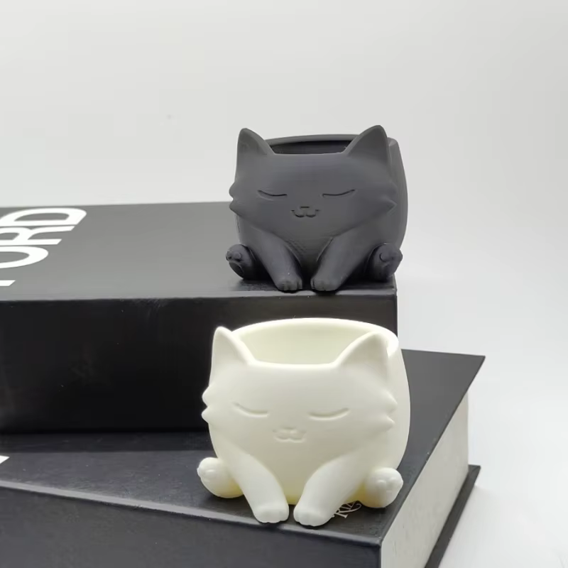Pot de fleurs en forme de chat mignon