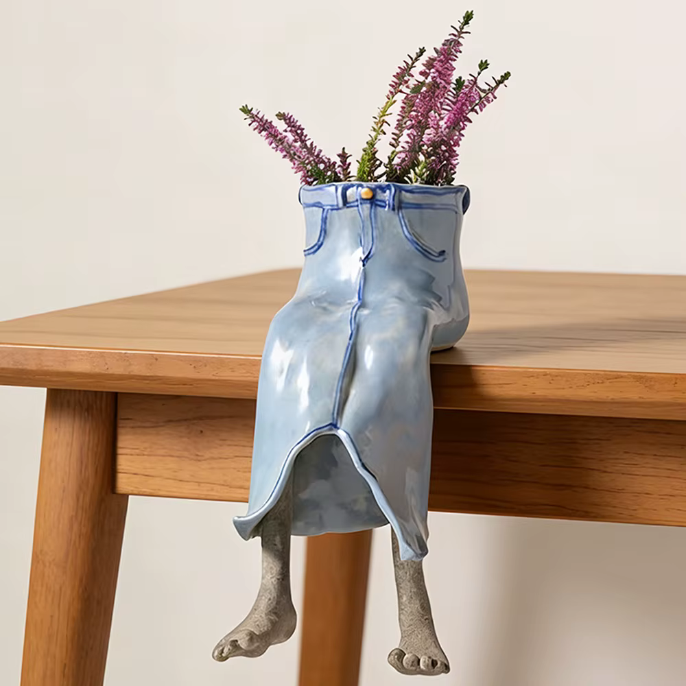Pot de fleurs suspendu en forme de jambe