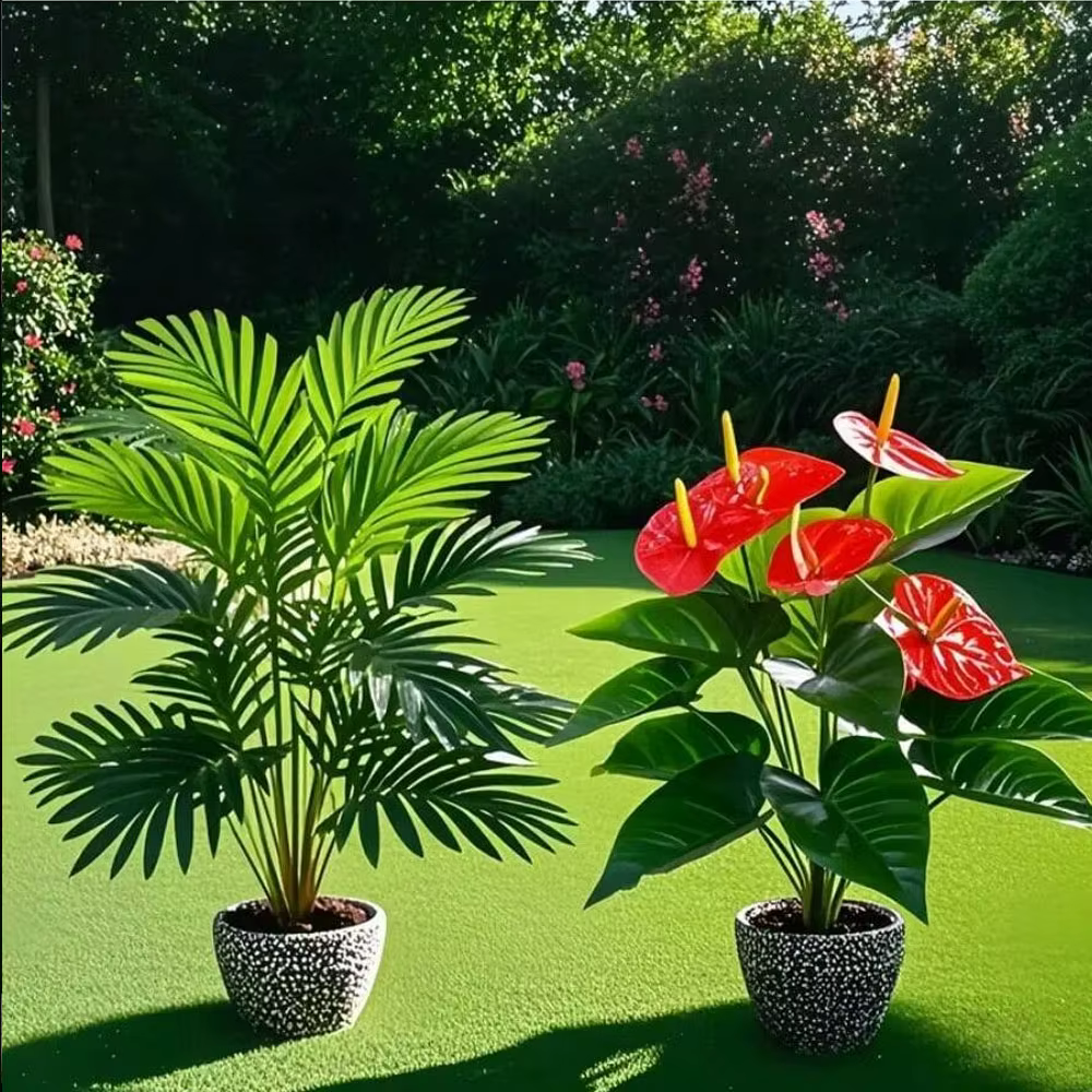 Grands plantes de palmier artificielles et feuilles de Cycads vertes Anthurium
