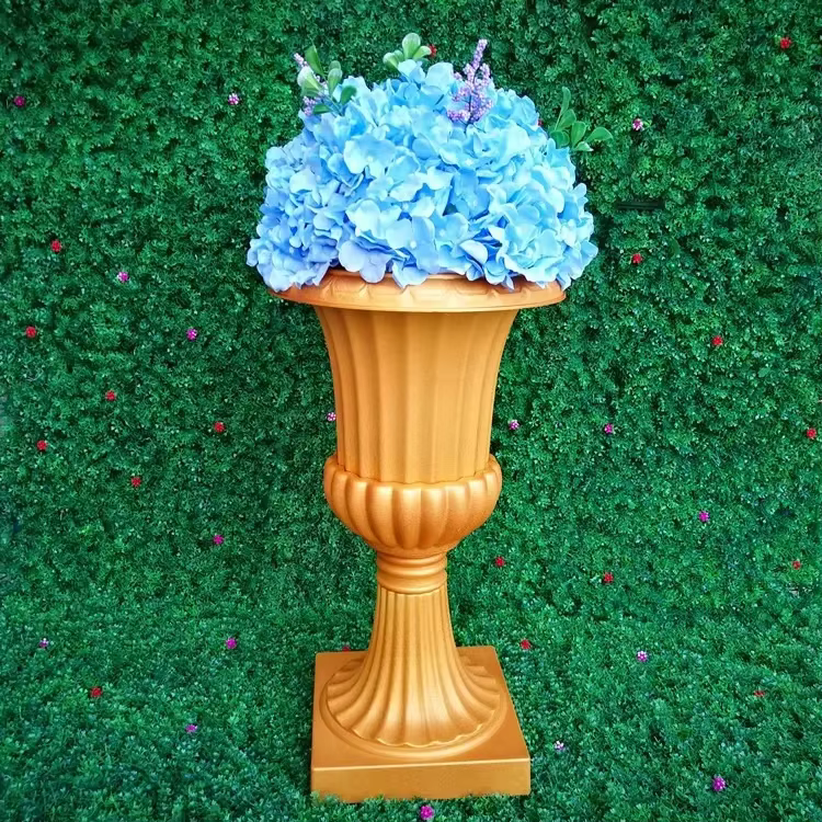 Pot de fleur en plastique doré et blanc