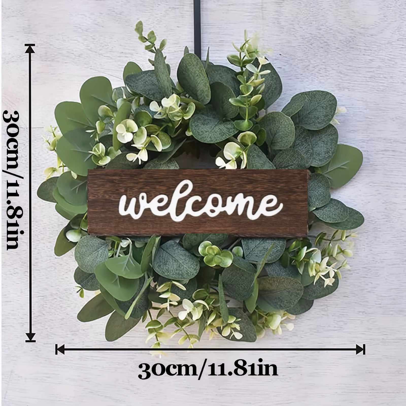 Couronne d'eucalyptus vert avec signe de bienvenue