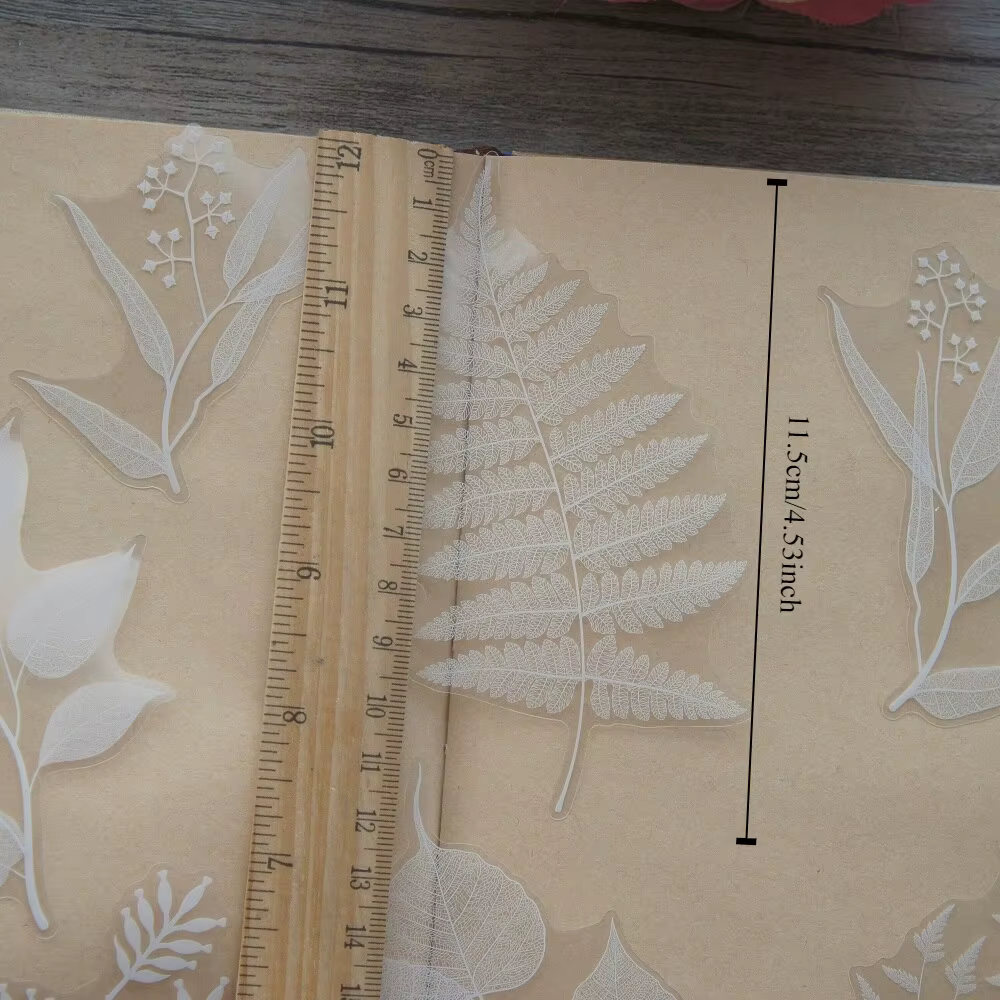 Autocollants en forme de feuilles blanches